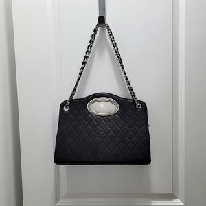 Quilted purse with zippered pockets